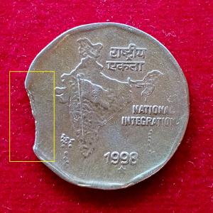 2 Rupees 1998 National Integration Curved Clip Error Coin (Hyderabad Mint)