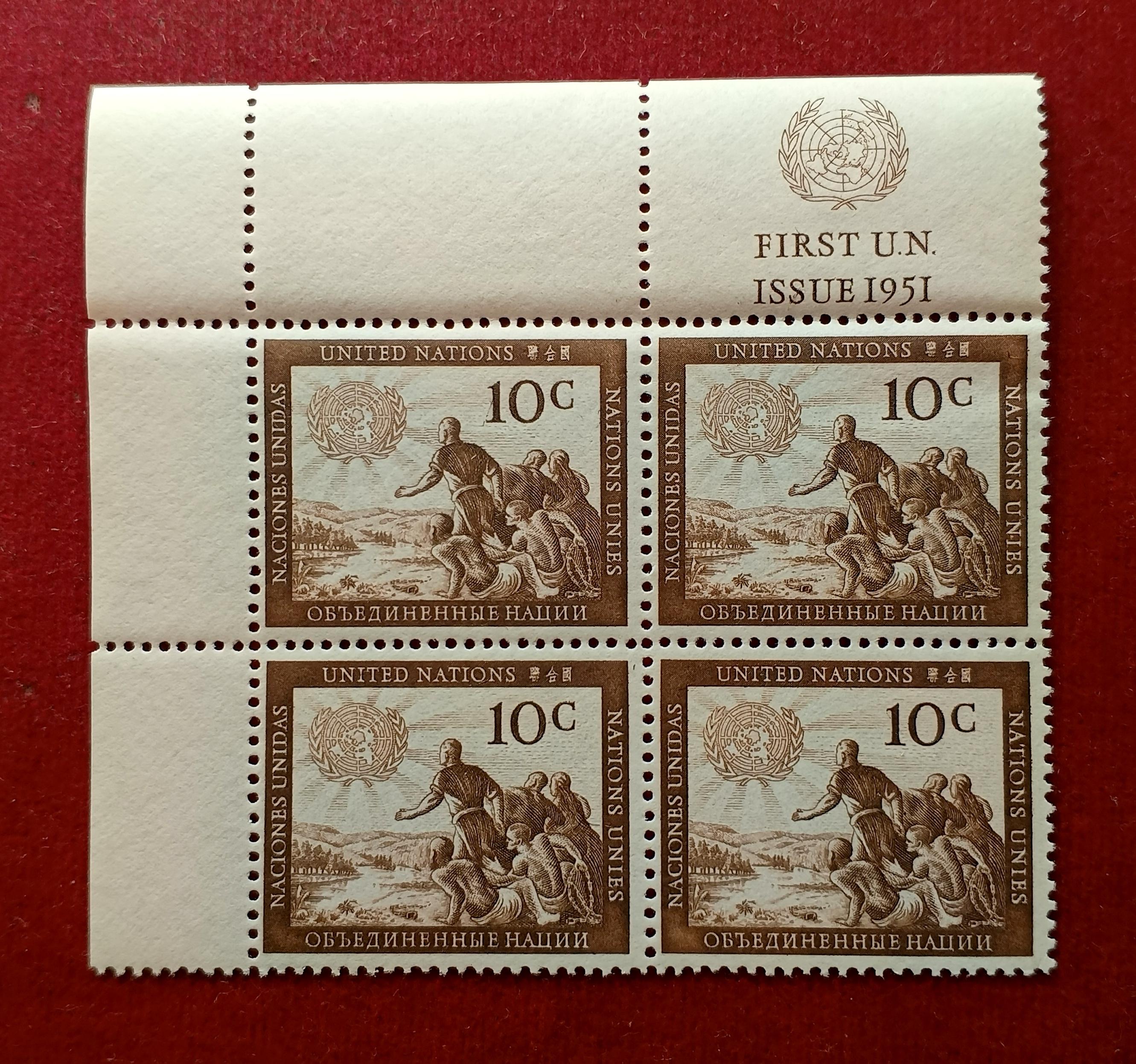 Stamp :- United Nations 1951 10¢ First Issue Stamp Block of Four – Featuring “Man Reaching for the Light” Design with Margin Inscription “FIRST U.N. ISSUE 1951”