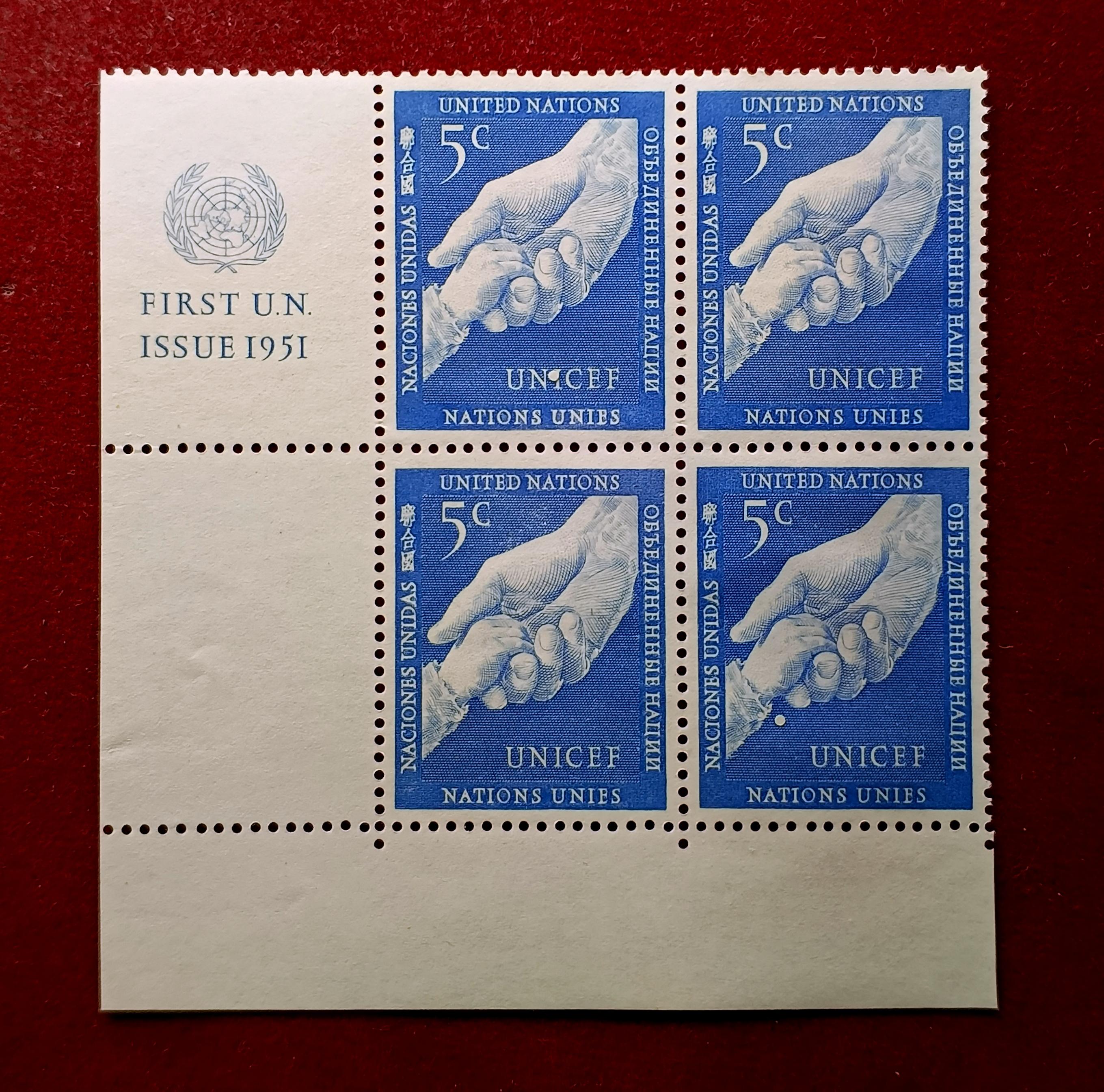 Stamp :- United Nations 1951 5¢ First Issue Stamp Block of Four – Featuring “Helping Hands (UNICEF)” Design with Margin Inscription “FIRST U.N. ISSUE 1951”