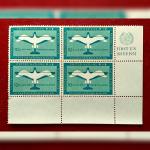 Stamp:- United Nations 1951 Air Mail First Issue 10¢ Stamp Block of Four – Featuring “Stylized Dove of Peace” Design with Margin Inscription “FIRST U.N. ISSUE 1951”