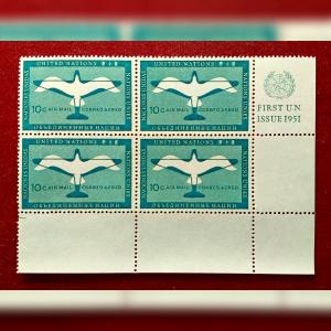 Stamp:- United Nations 1951 Air Mail First Issue 10¢ Stamp Block of Four – Featuring “Stylized Dove of Peace” Design with Margin Inscription “FIRST U.N. ISSUE 1951”