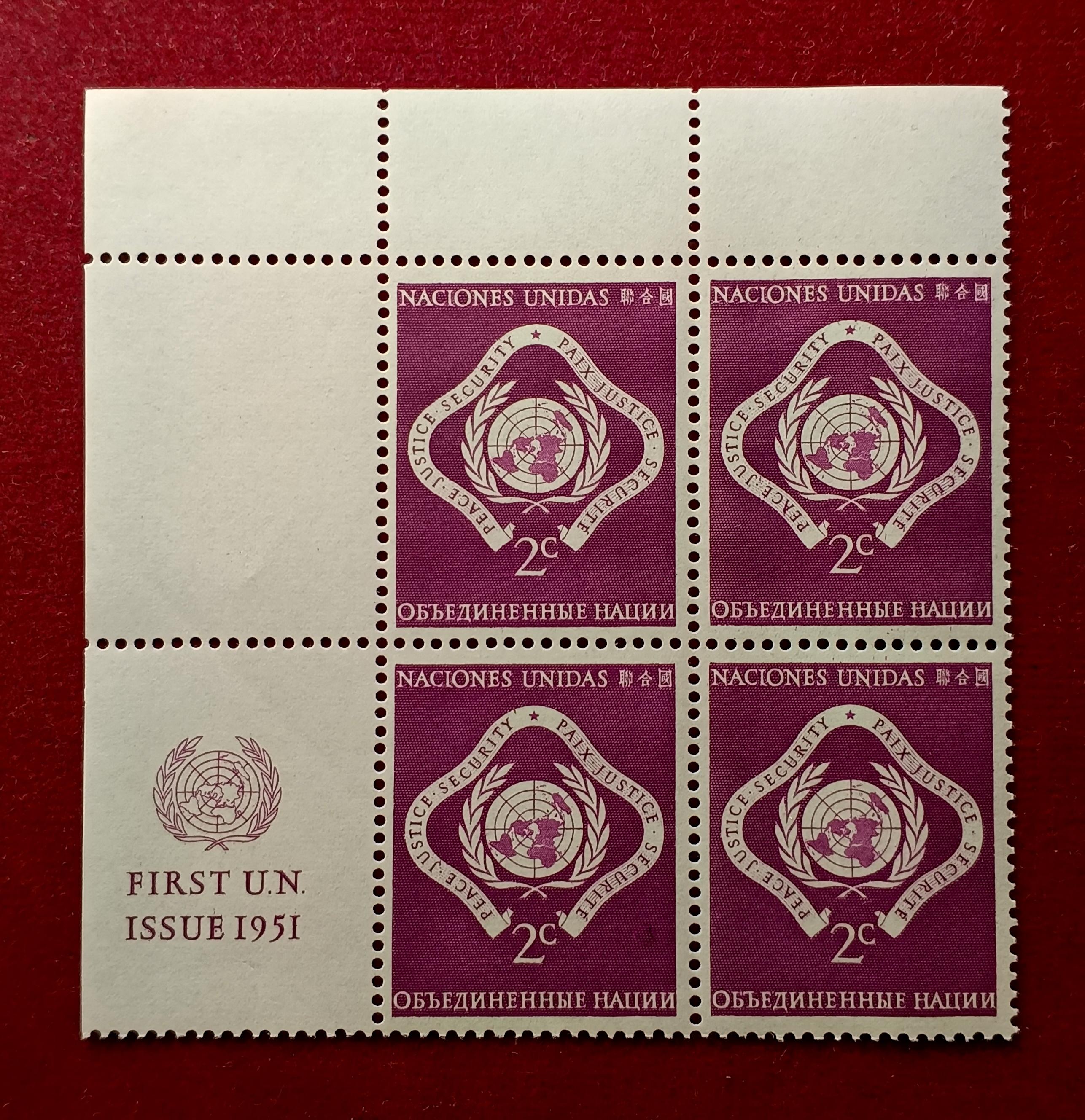 Stamp :- United Nations 1951 First Issue Stamp 2¢ Block of Four – Featuring “Peace, Justice, and Security” Emblem with Margin Inscription “FIRST U.N. ISSUE 1951”